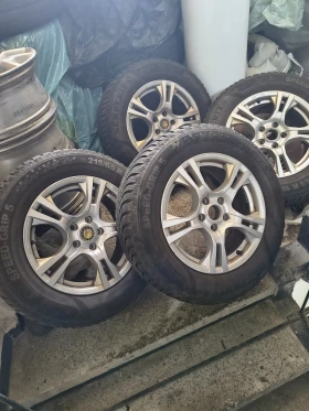 Гуми Зимни 215/65R16, снимка 7 - Гуми и джанти - 53138424