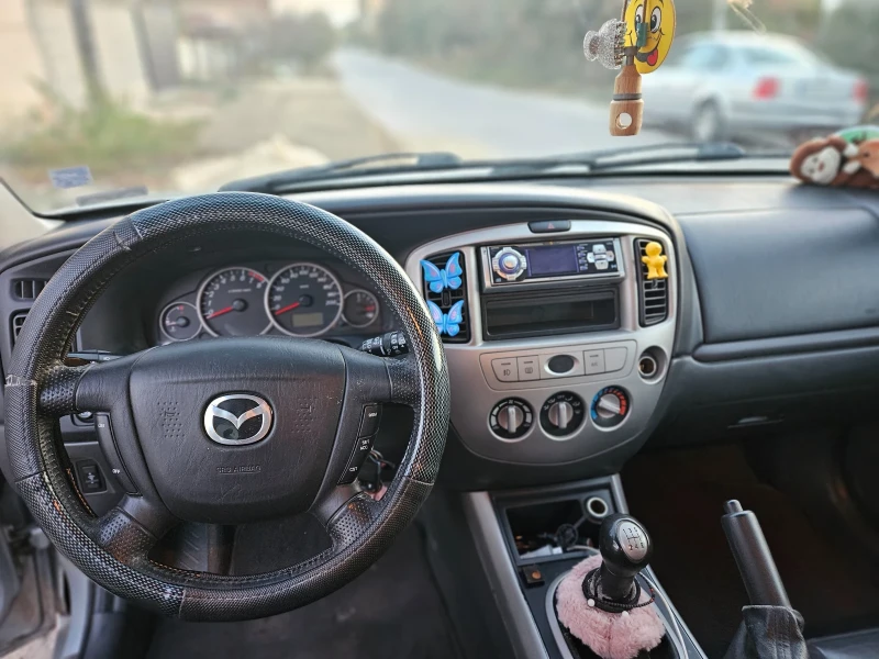 Mazda Tribute, снимка 9 - Автомобили и джипове - 47720657