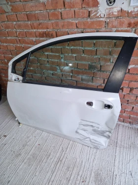 ТОЙОТА ЯРИС ДВУВРАТКА.TOYOTA YARIS  XP130.предна лява врата XP130, снимка 1