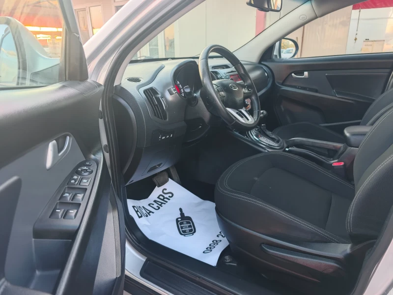 Kia Sportage 2.0 CRDI 4X4 , снимка 10 - Автомобили и джипове - 51070234
