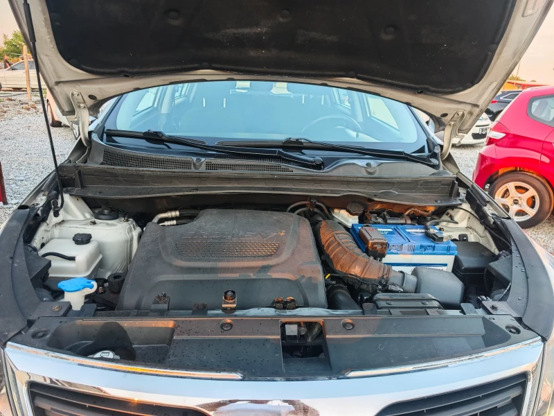 Kia Sportage 2.0 CRDI 4X4 , снимка 15 - Автомобили и джипове - 51070234
