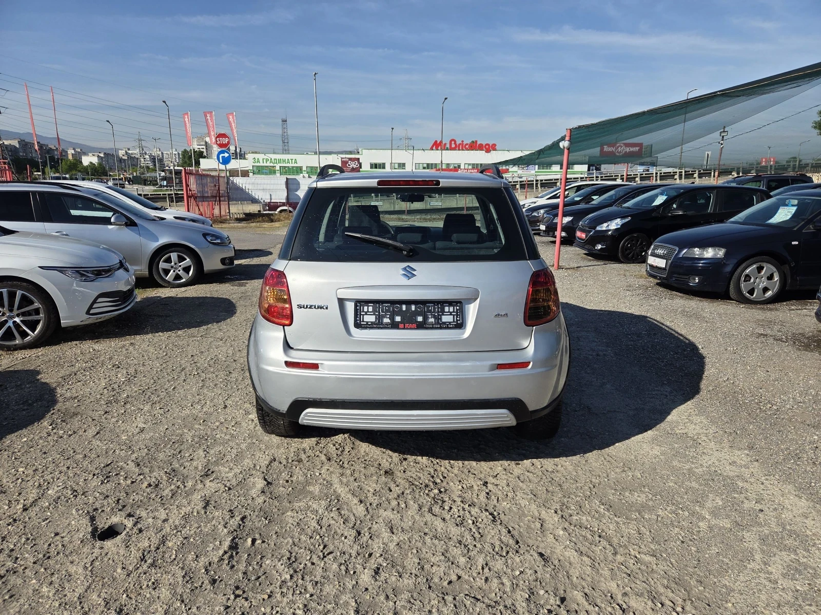 Suzuki SX4 1.6i/gaz/4x4, снимка 5 - Автомобили и джипове - 53210182