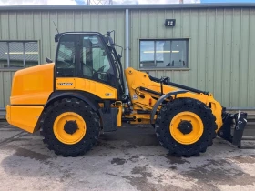 Телескопични товарачи JCB TM320, снимка 1