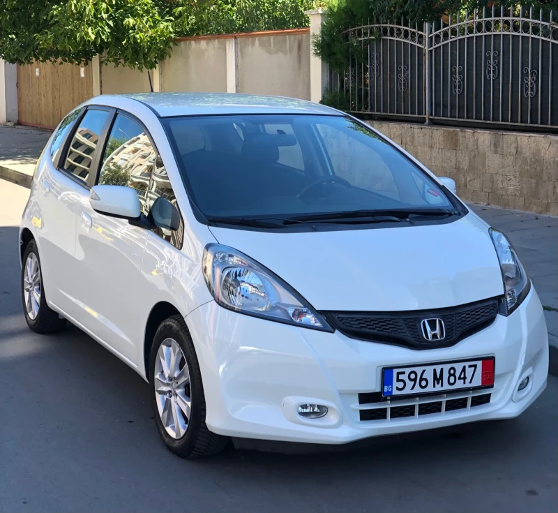 Honda Jazz 1.4i Swiss , снимка 1 - Автомобили и джипове - 47193404