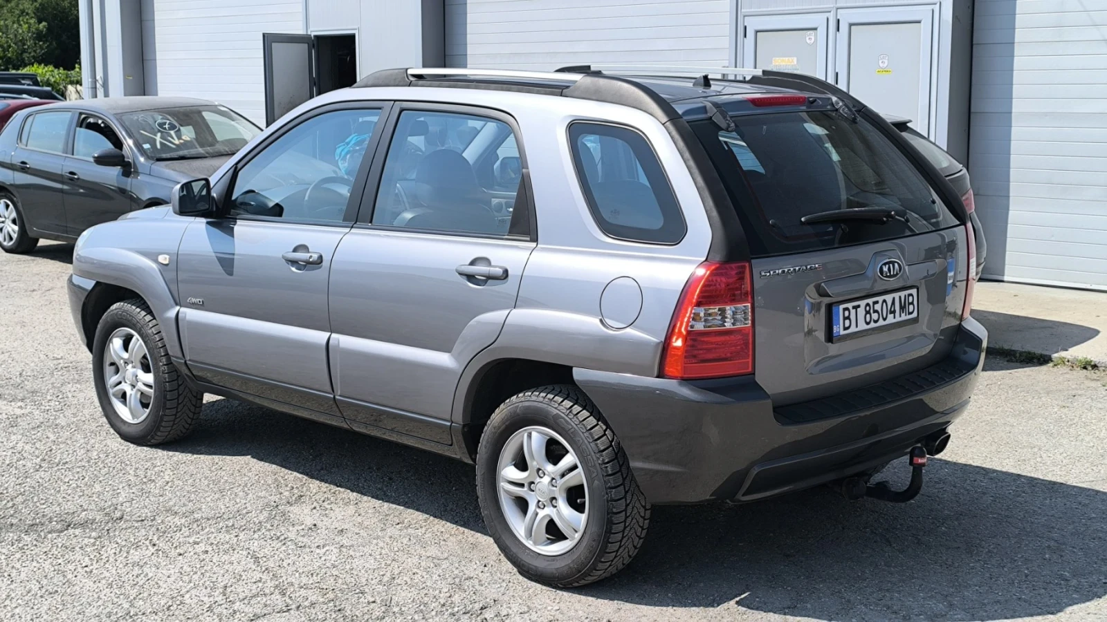 Kia Sportage 2.0i 4x4, снимка 2 - Автомобили и джипове - 55431214