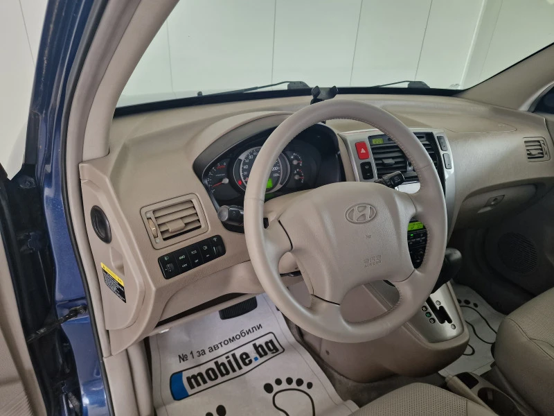 Hyundai Tucson 2.0 112кс 4х4, снимка 13 - Автомобили и джипове - 46354985