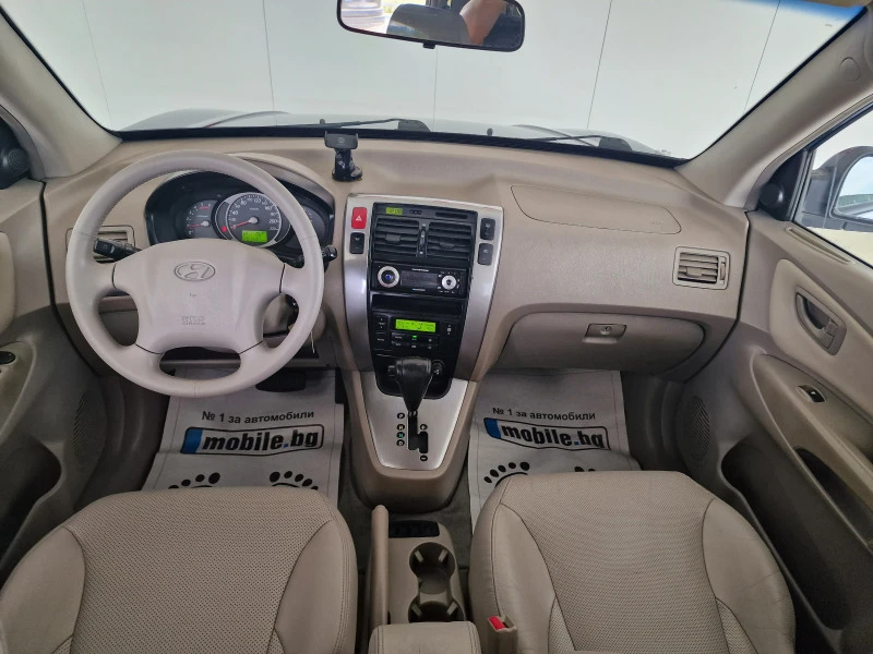 Hyundai Tucson 2.0 112кс 4х4, снимка 15 - Автомобили и джипове - 46354985