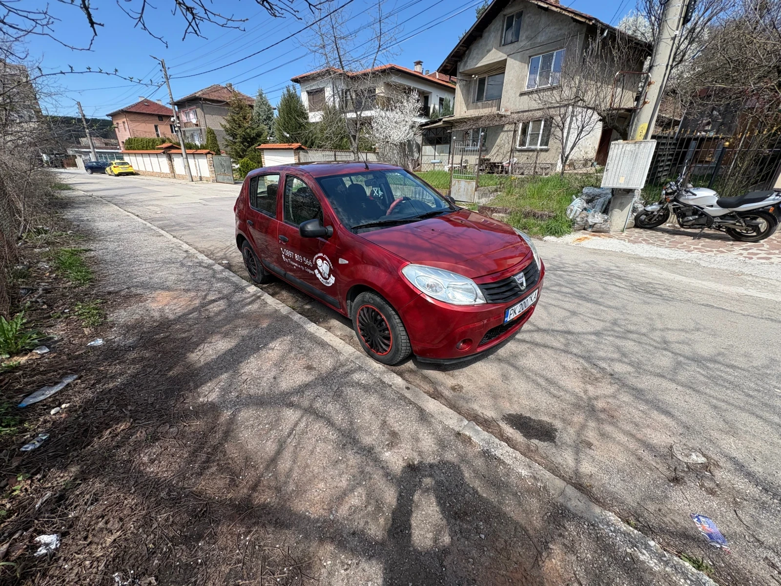 Dacia Sandero 1.4LPG, снимка 5 - Автомобили и джипове - 54640508