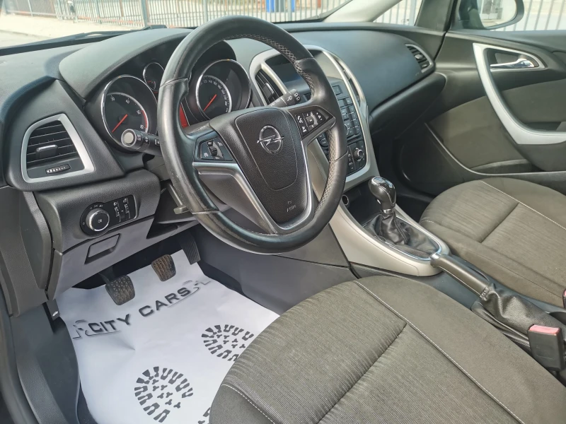 Opel Astra 1.7 CDTI, снимка 11 - Автомобили и джипове - 51051629