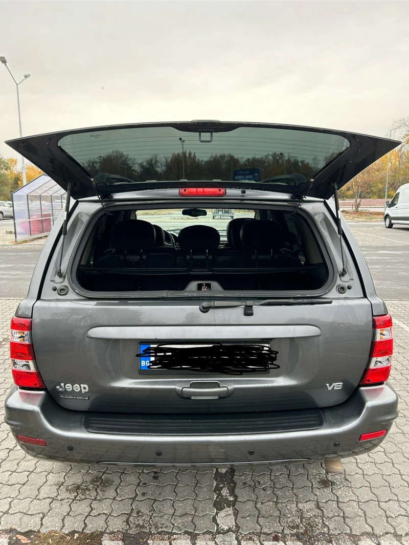 Jeep Grand cherokee 4.7/ГАЗ, снимка 15 - Автомобили и джипове - 47983710