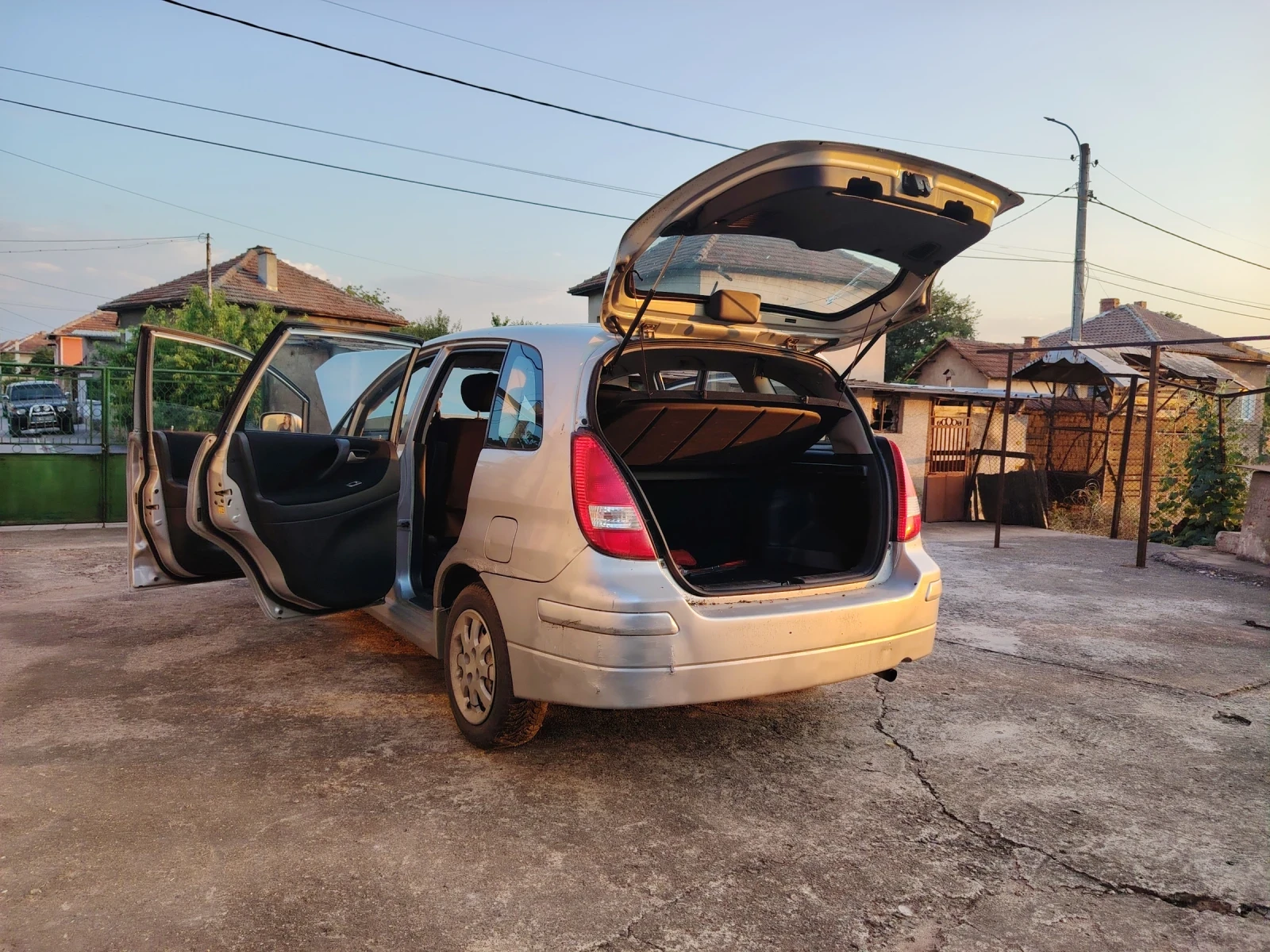 Suzuki Liana 1400, снимка 11 - Автомобили и джипове - 55564947