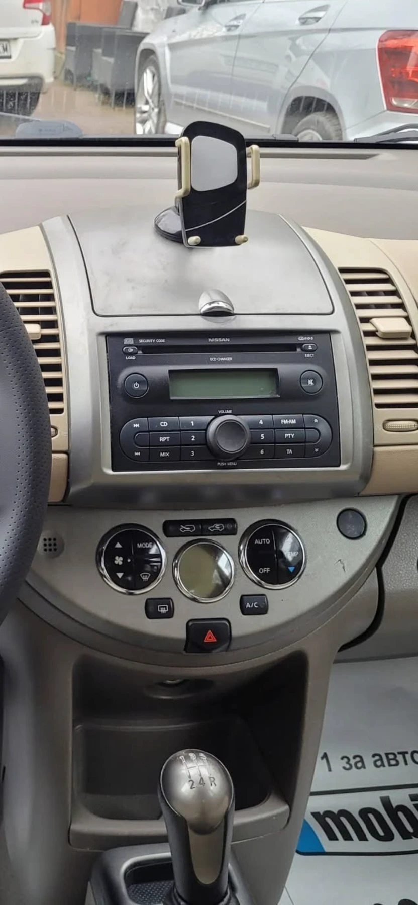 Nissan Note 1.6i 110кс - изображение 8