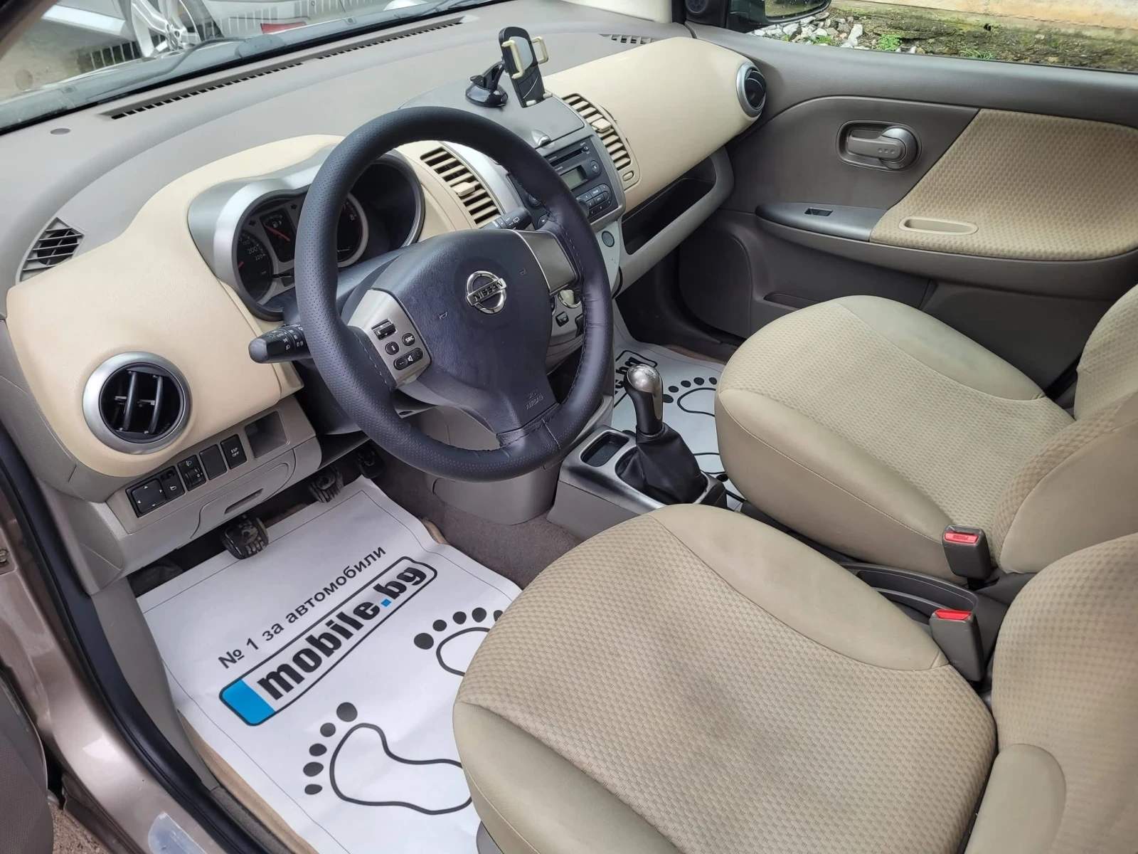 Nissan Note 1.6i 110кс - изображение 5