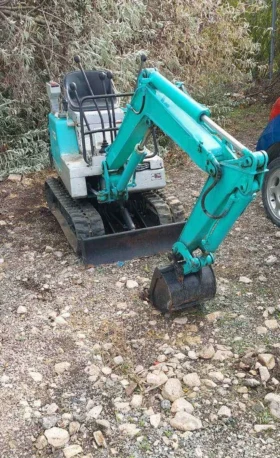 Багер Komatsu PC03