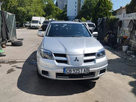 Mitsubishi Outlander 2.4 Газ