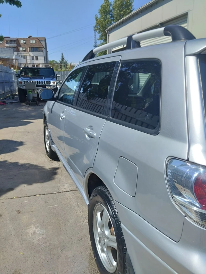 Mitsubishi Outlander 2.4 Газ, снимка 13 - Автомобили и джипове - 47890258