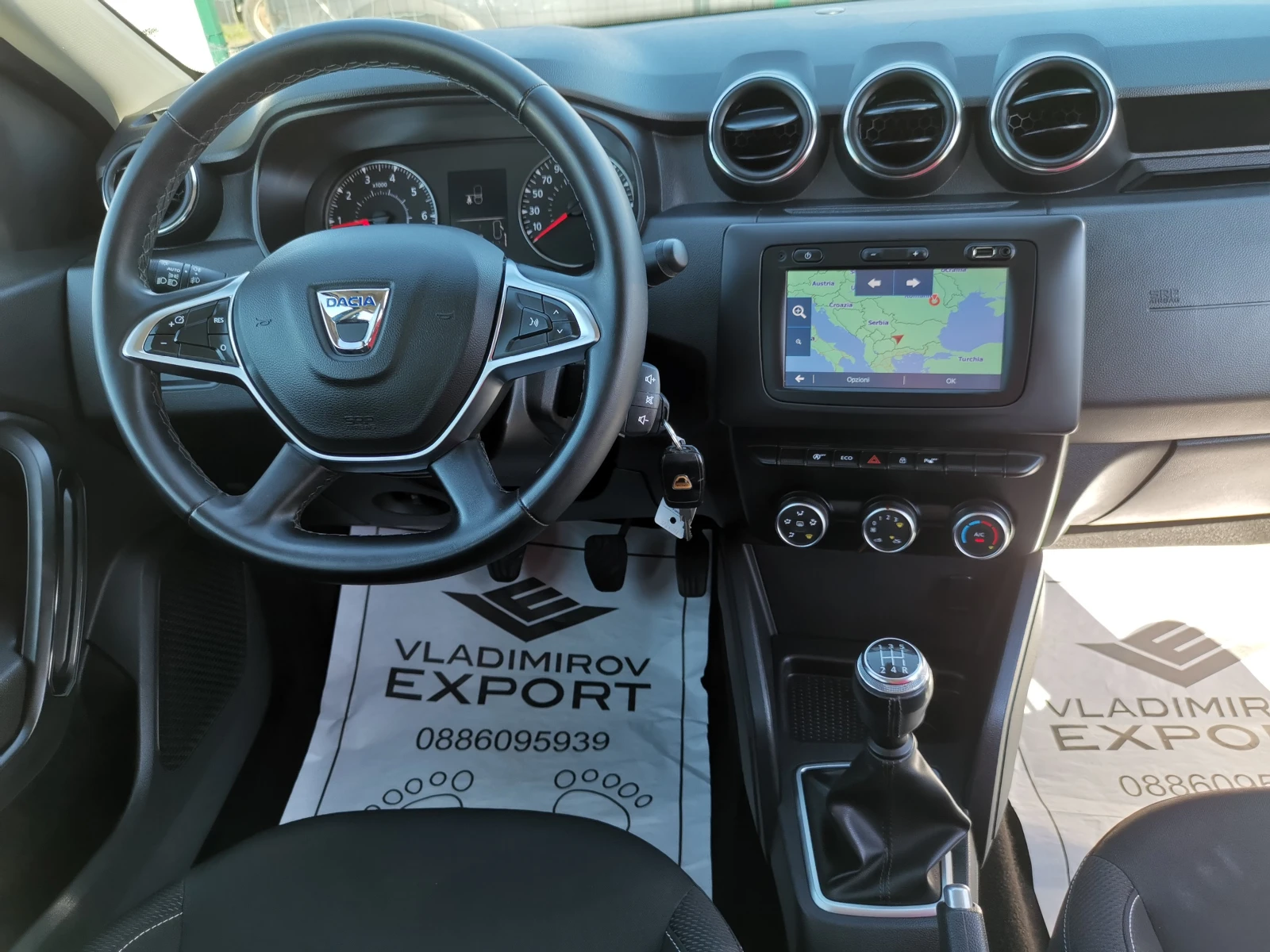 Dacia Duster 1.6i E6C PRESTIGE | Mobile.bg — изображение 14