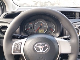 Toyota Yaris 1.0 i, снимка 14 - Автомобили и джипове - 45174937