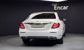 Mercedes-Benz E 220 EXCLUSIVE* ПАМЕТ* КАМЕРА* ПОДГРЕВ* ПАНОРАМА* КОЖА, снимка 4