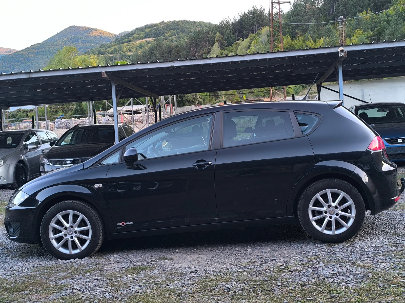 Seat Leon FACE LIFT-1.6TDI-90кс-КЛИМАТРОНИК-EURO 5b !!!, снимка 6 - Автомобили и джипове - 56130110