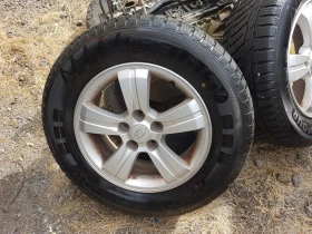 Kia Sportage 2.0iЛети джанти с гуми