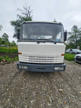 Nissan L35 Самосвал