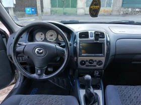 Mazda 323 Газ, снимка 7 - Автомобили и джипове - 53659361