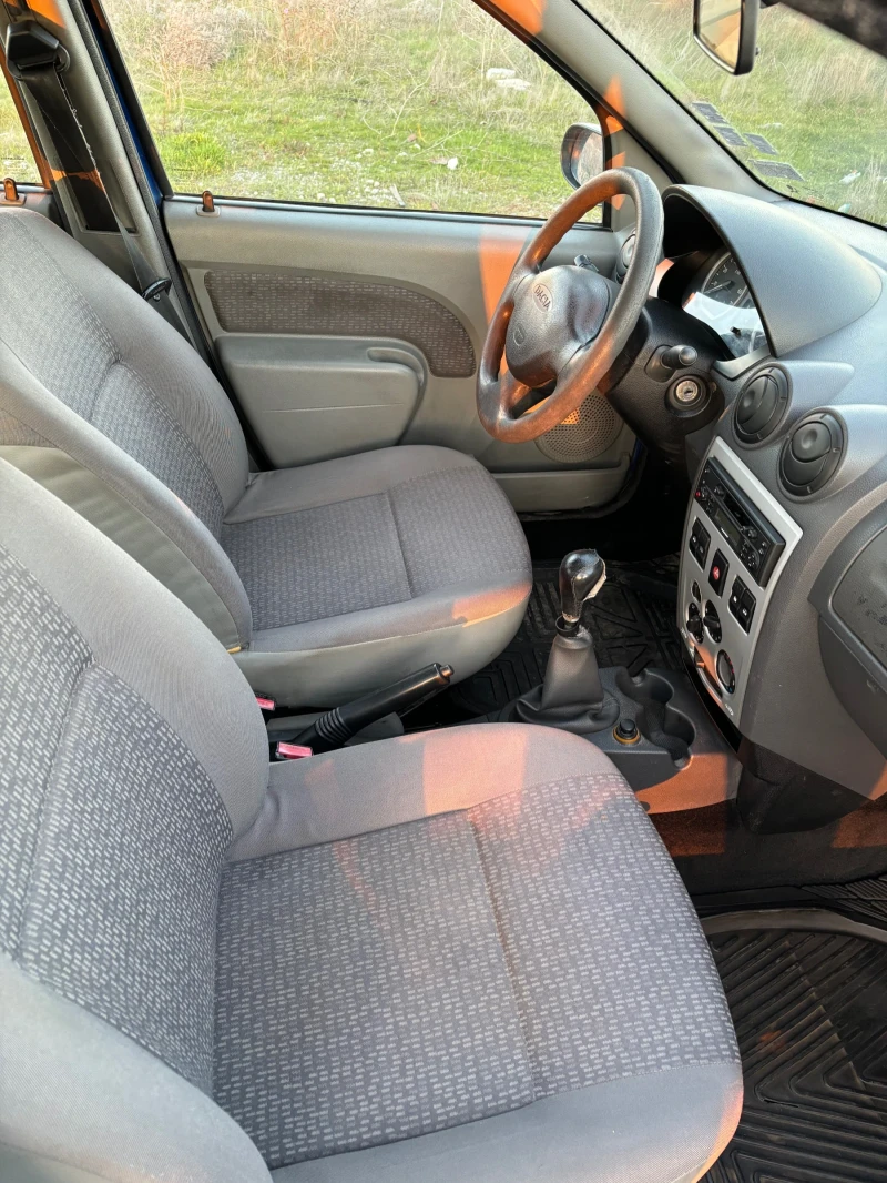 Dacia Logan 1.4 MPI, снимка 11 - Автомобили и джипове - 52789407