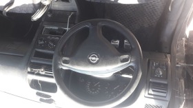 Opel Astra 1.6 mi, снимка 9 - Автомобили и джипове - 41228250