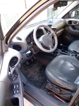 Hyundai Santa fe 2.4 16V 2WD LPG  - 900 € / 1760.25 лв. - 58322214 6
