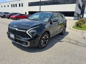 ������ Kia Sportage
