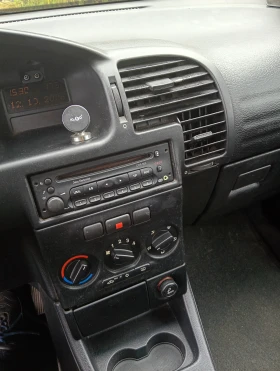 Opel Zafira Елеганс, снимка 13