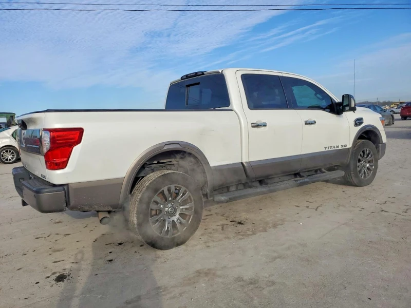 Nissan Titan crew cab 5.0l Titan Xd Sl, снимка 3 - Автомобили и джипове - 53587385