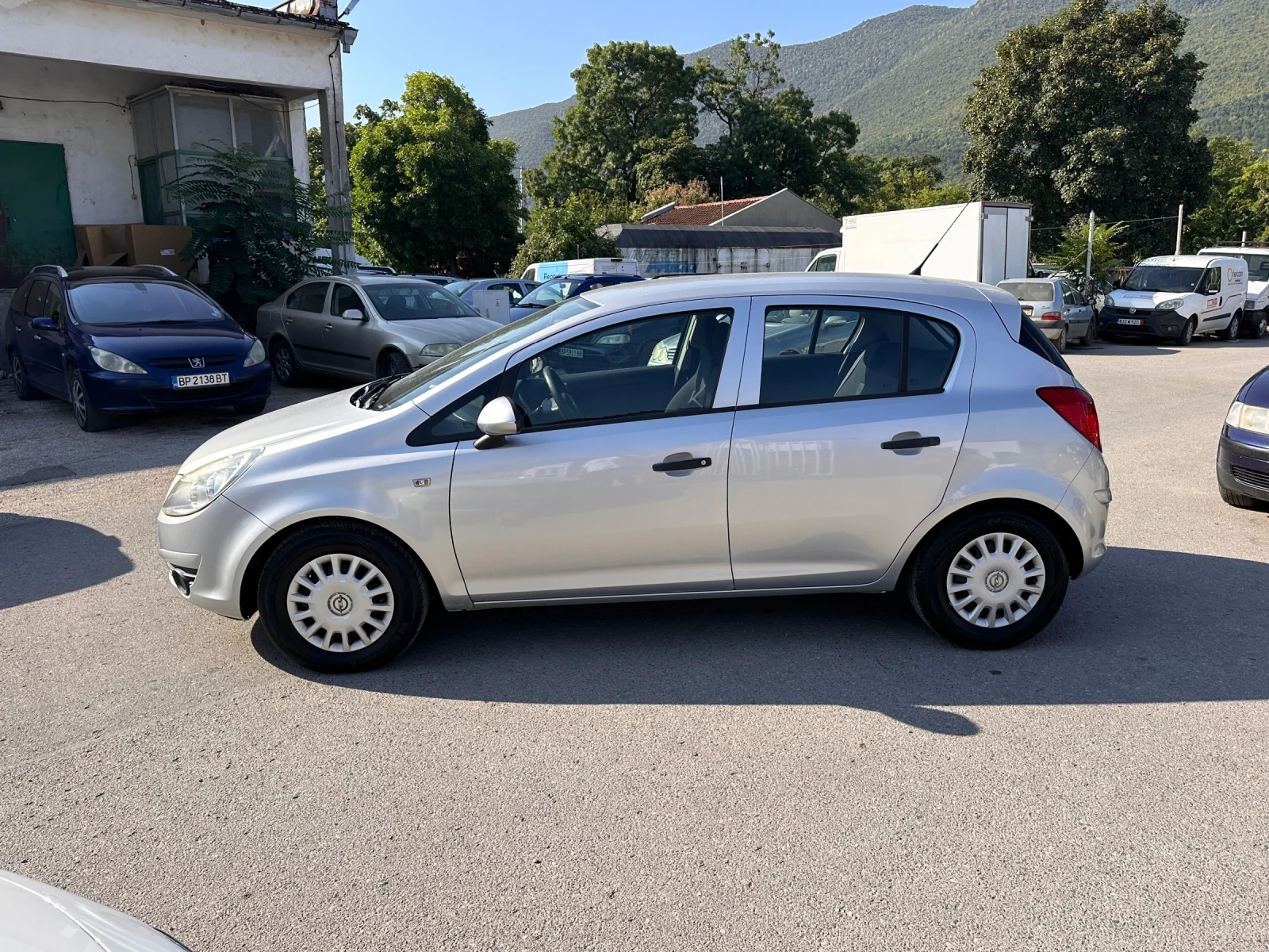 Opel Corsa КЛИМАТИК - РЕАЛНИ КИЛОМЕТРИ , снимка 8 - Автомобили и джипове - 55610379