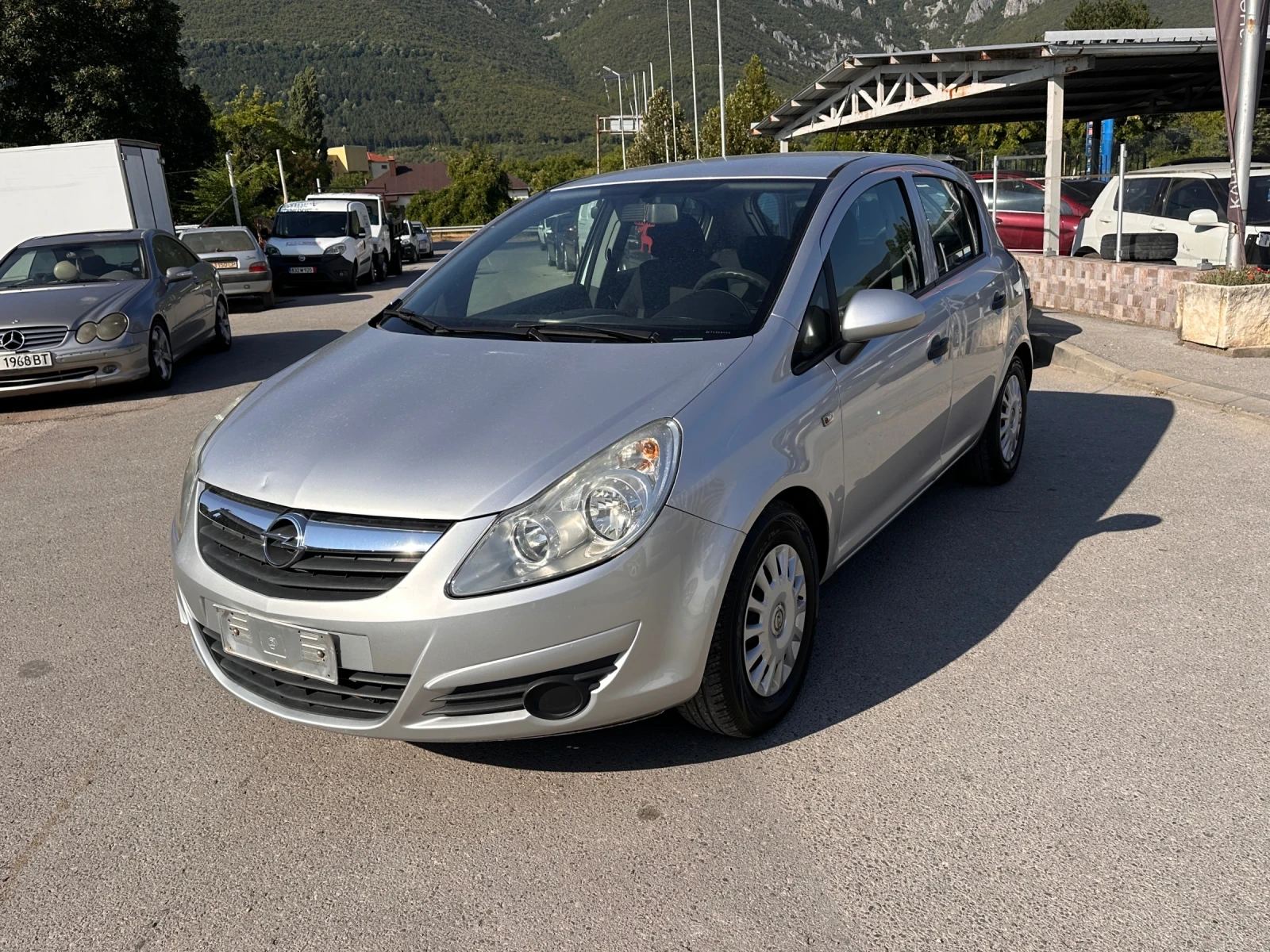 Opel Corsa КЛИМАТИК - РЕАЛНИ КИЛОМЕТРИ , снимка 1 - Автомобили и джипове - 55610379