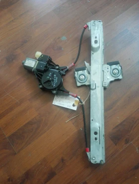 Моторче ел стъкло предно дясно Форд Фиеста 10г.