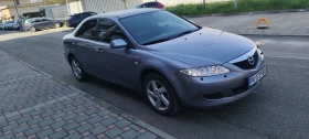 ������ Mazda 6