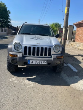 ������ Jeep Cherokee