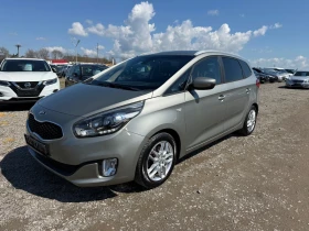 ������ Kia Carens