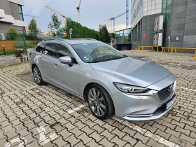 ������ Mazda 6