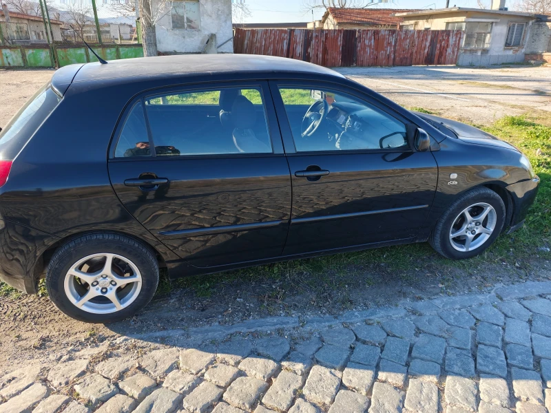 Toyota Corolla 2.0TDI 90ks, снимка 8 - Автомобили и джипове - 52940653