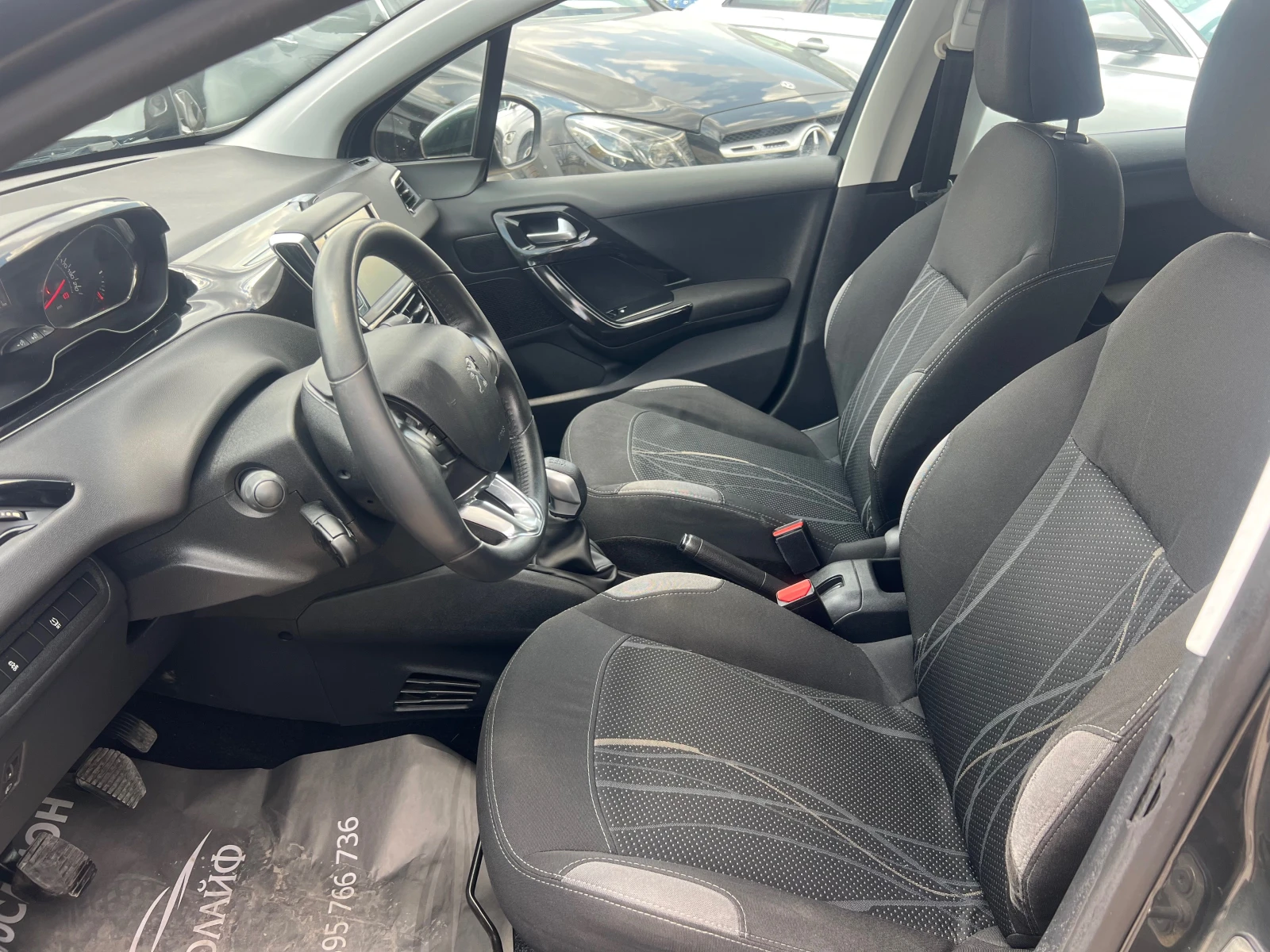Peugeot 208 1.4 E-hdi - изображение 10