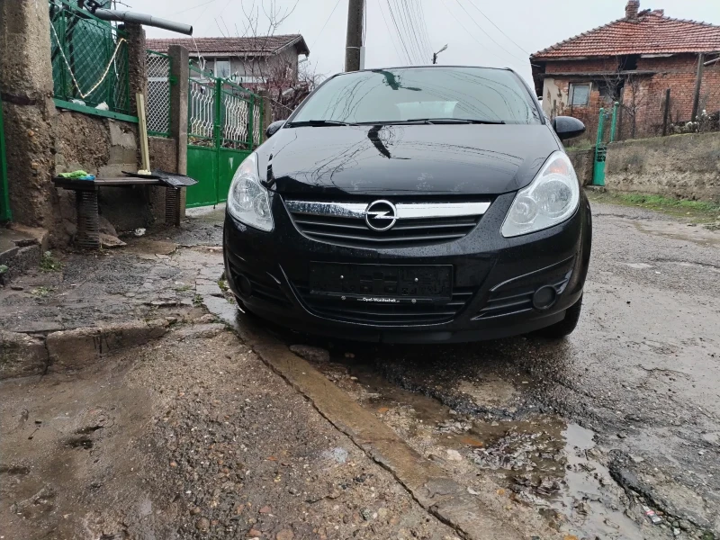 Opel Corsa 1.2i 16V, снимка 9 - Автомобили и джипове - 48425573