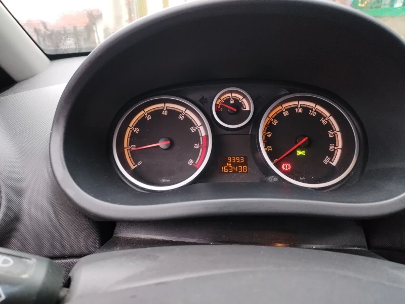 Opel Corsa 1.2i 16V, снимка 11 - Автомобили и джипове - 48425573