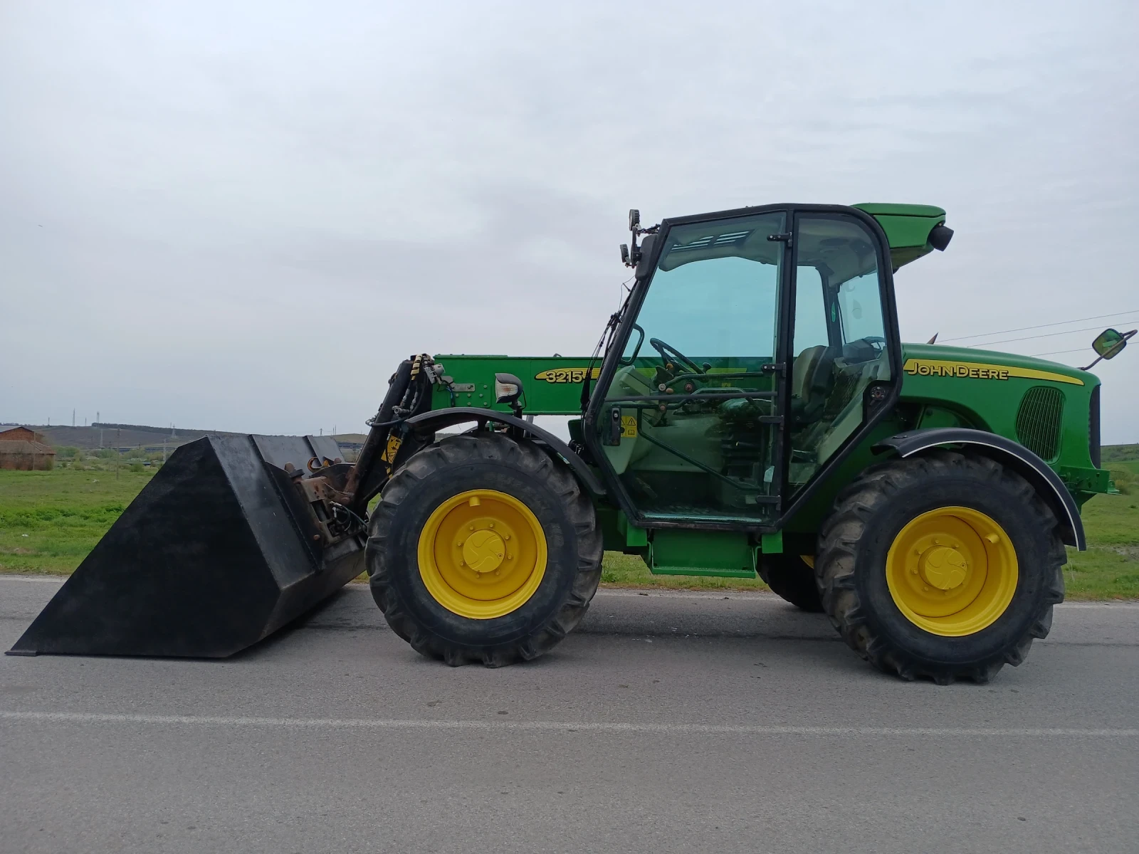 Телескопичен товарач John Deere John Deer 3215