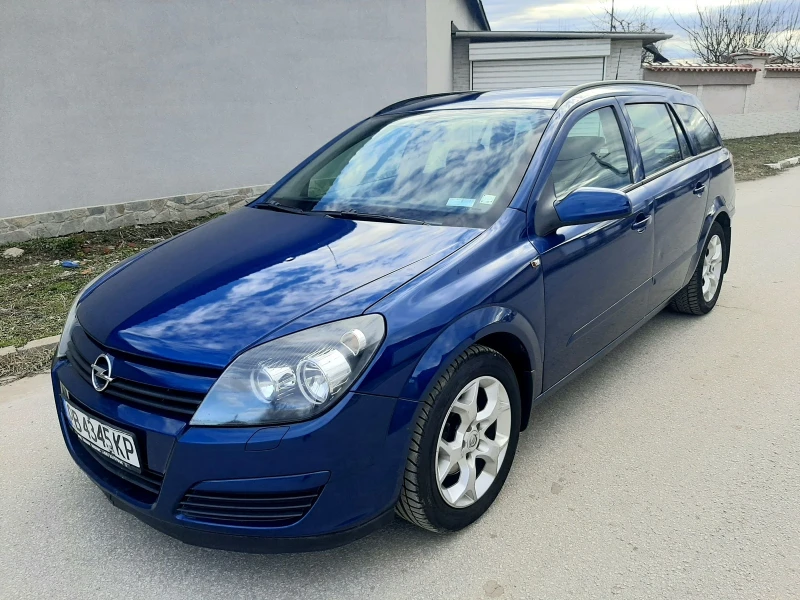 Opel Astra 1.6i+ КЛИМА. ГАЗ. БЕНЗИН. ТОП , снимка 9 - Автомобили и джипове - 48553874