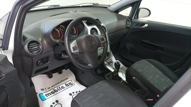 Opel Corsa 1.3 D, снимка 9 - Автомобили и джипове - 47364167