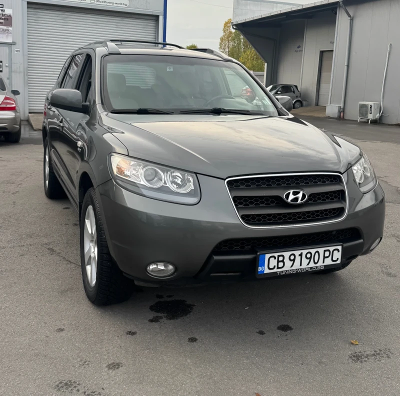 Hyundai Santa fe 2.2 4WD/АВТОМАТ/ПОДГРЕВИ/ANDROID/КОЖА ТОП!!!, снимка 6 - Автомобили и джипове - 52353856