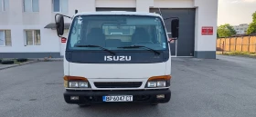 Isuzu Npr Бордови 4.60 д. 2.10ш. * КЛИМАТИК* , снимка 1