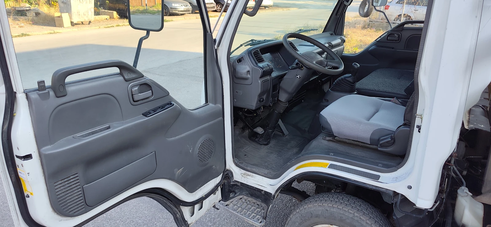 Isuzu Npr Бордови 4.60 д. 2.10ш. * КЛИМАТИК* , снимка 12 - Камиони - 55754155
